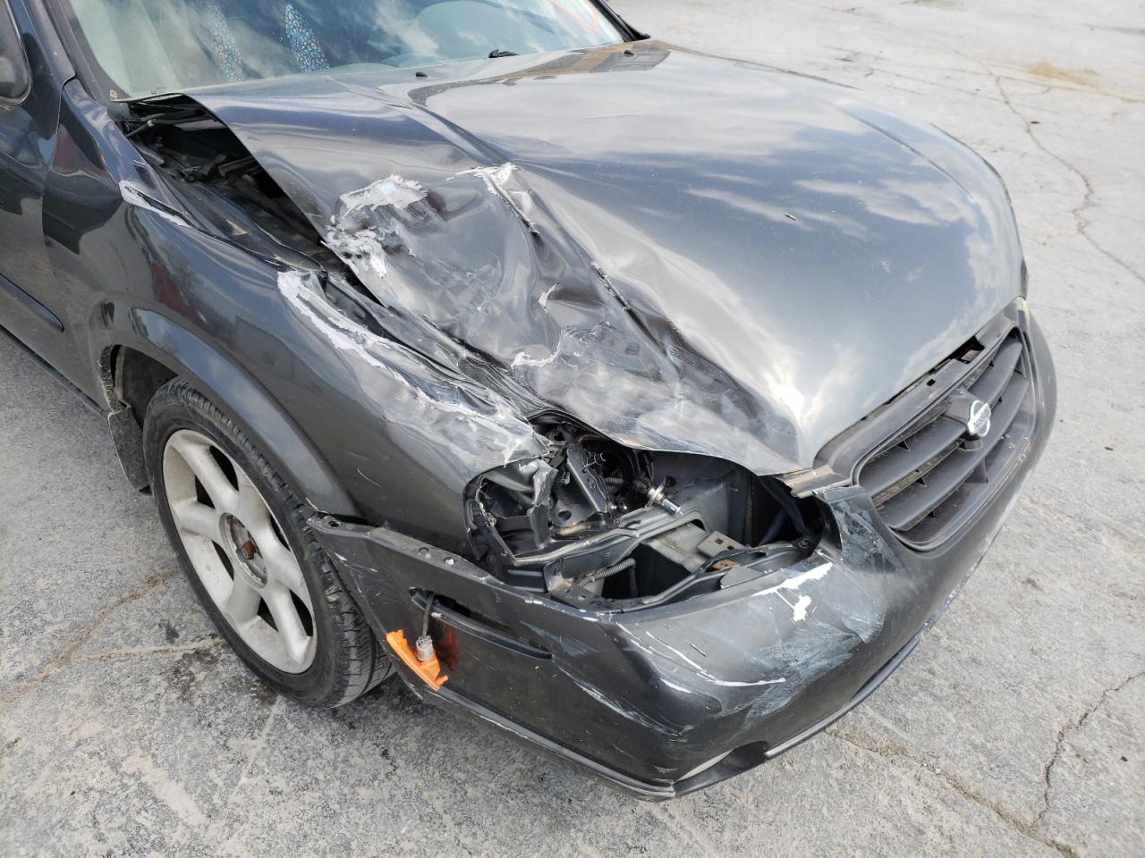 Photo 9 from auction – 2000 NISSAN MAXIMA GLE with VIN JN1CA31D3YT521580