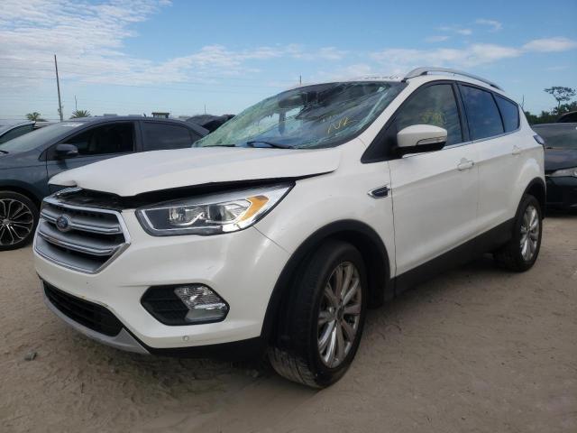 Photo 2 from auction – 2017 FORD ESCAPE TIT with VIN 1FMCU0J9XHUD49214