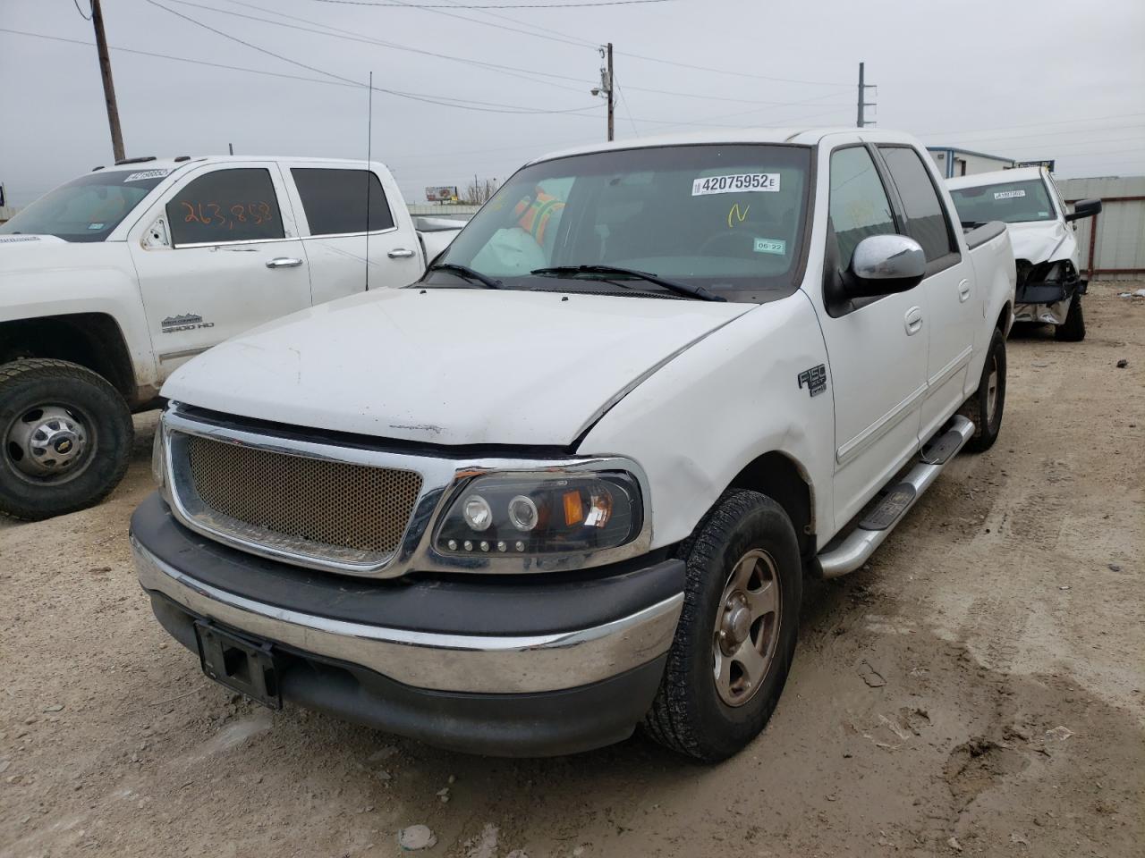 Photo 2 from auction – 2002 FORD F150 SUPER with VIN 1FTRW07L92KC55761