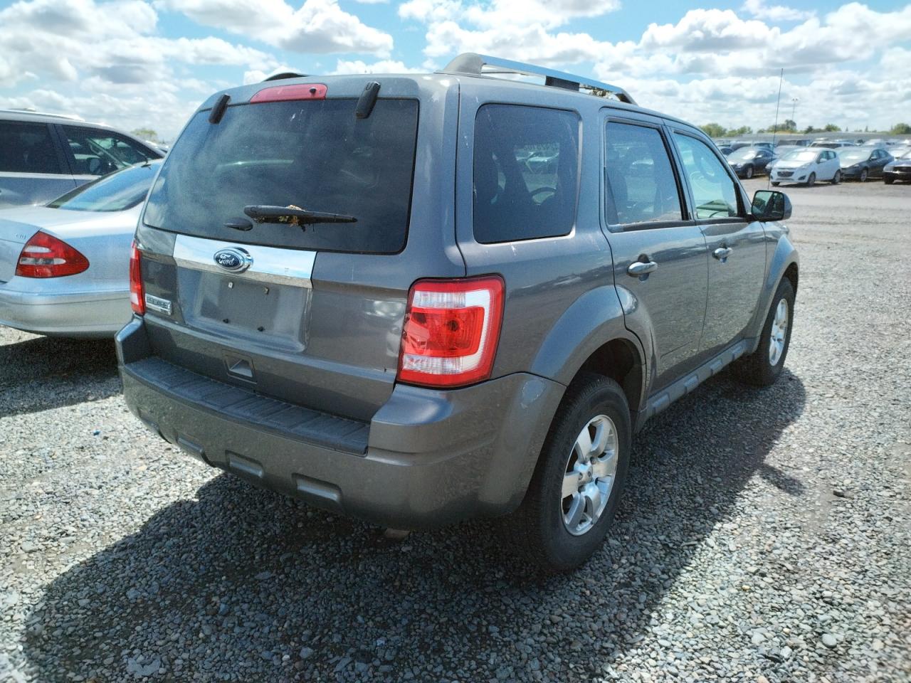 Photo 4 from auction – 2011 FORD ESCAPE LIM with VIN 1FMCU0E7XBKC54518