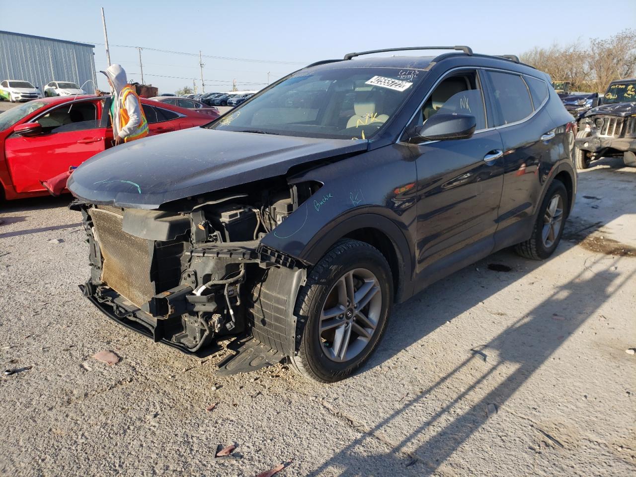 Photo 2 from auction – 2017 HYUNDAI SANTA FE S with VIN 5NMZU3LB7HH021143