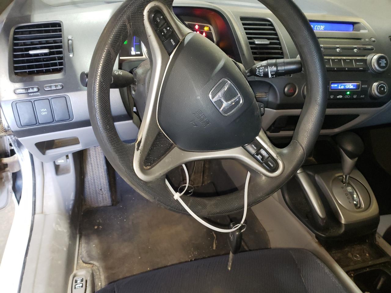 Photo 10 from auction – 2010 HONDA CIVIC HYBR with VIN JHMFA3F22AS007828