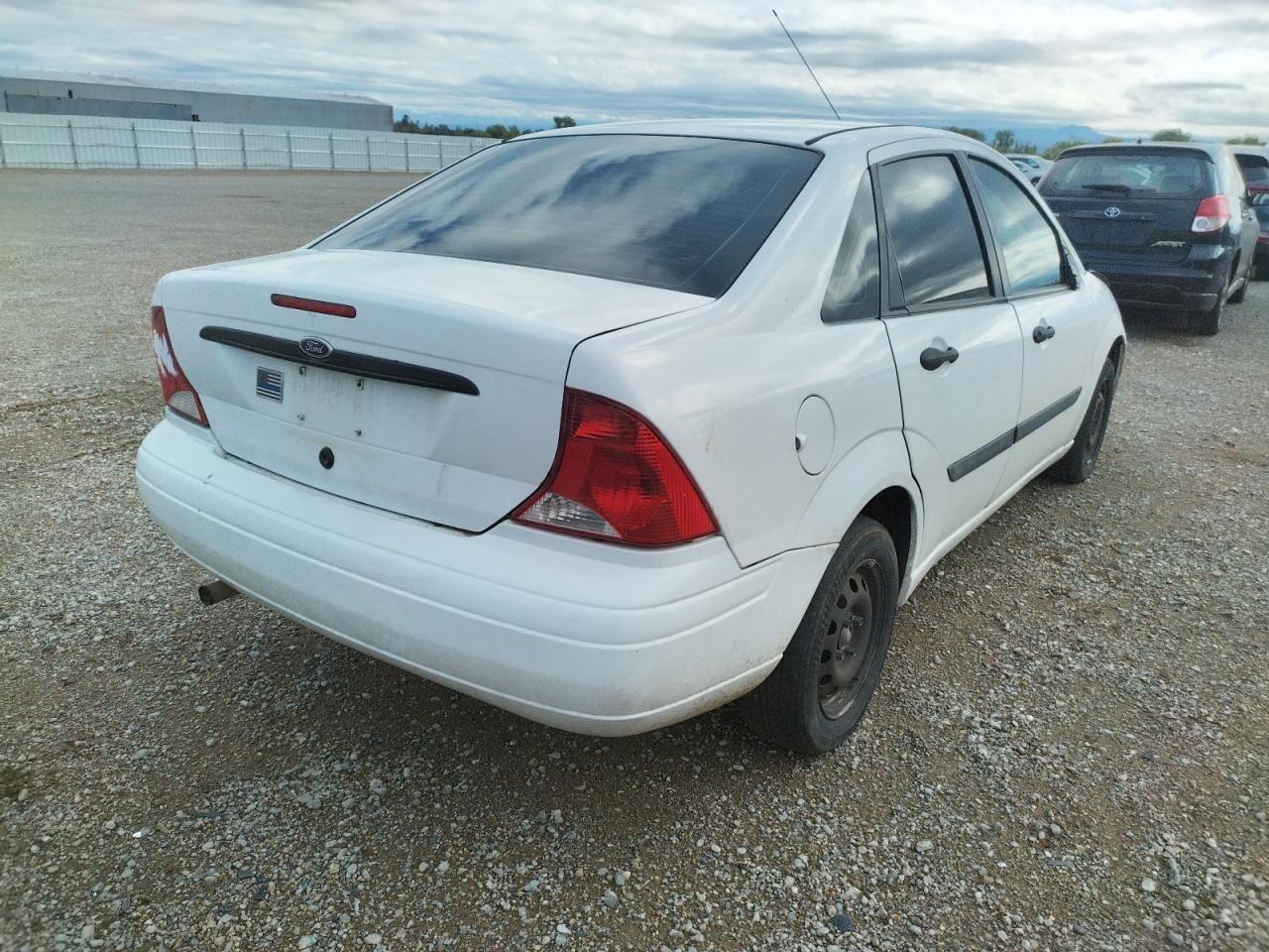 Photo 4 from auction – 2003 FORD FOCUS LX with VIN 1FAFP33Z23W339108