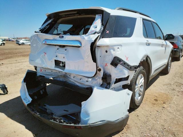 Photo 4 from auction – 2021 FORD EXPLORER X with VIN 1FMSK7DH7MGB02559