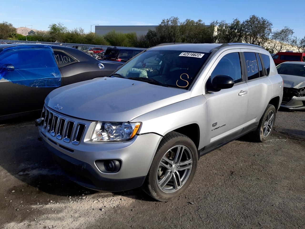 Photo 2 from auction – 2011 JEEP COMPASS LI with VIN 1J4NT5FB8BD203128