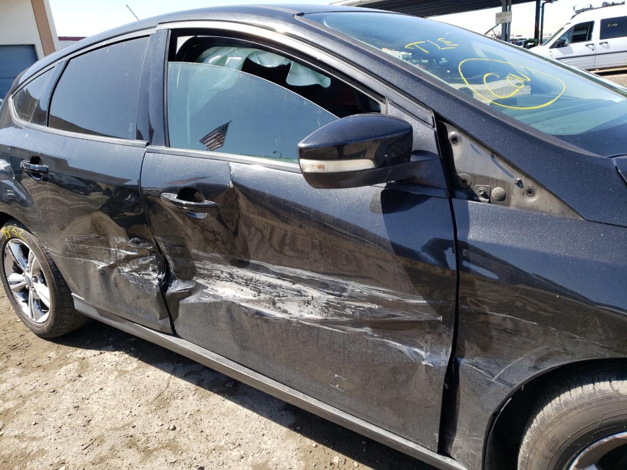 Photo 9 from auction – 2013 FORD FOCUS SE with VIN 1FADP3K2XDL340912