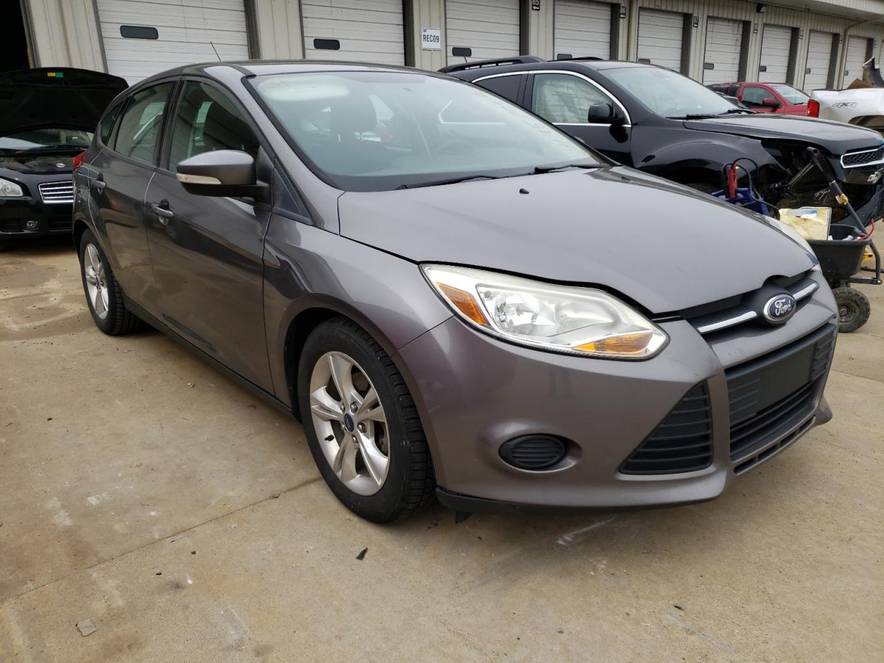 FORD FOCUS SE 2014 with VIN 1FADP3K24EL167289 - Photo from auction