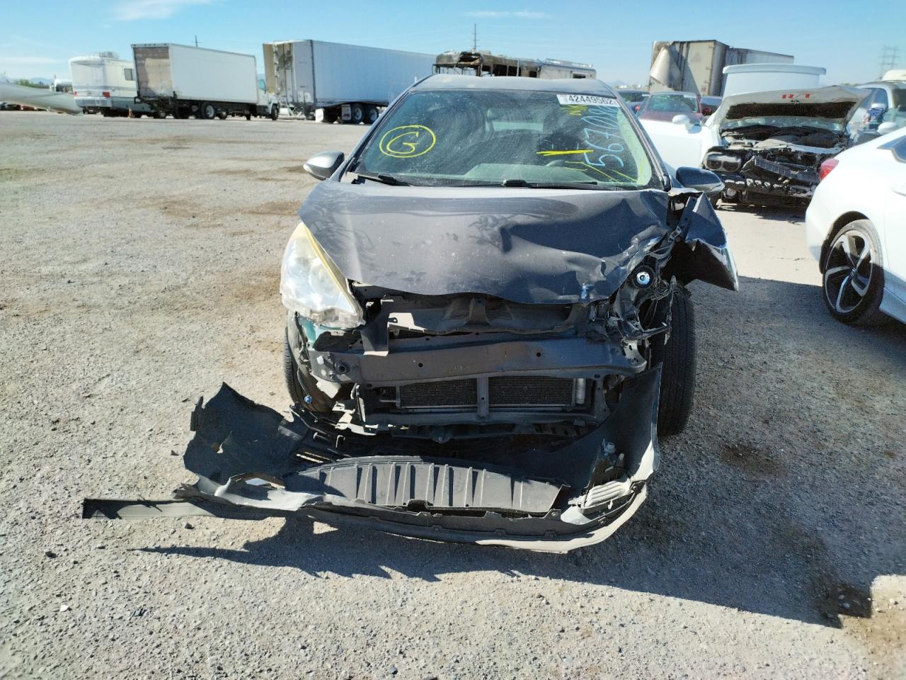 Photo 9 from auction – 2014 TOYOTA PRIUS C with VIN JTDKDTB38E1567080