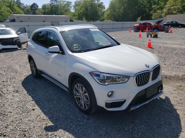 BMW X1 XDRIVE2 2017 with VIN WBXHT3Z32H4A55777 - Photo from auction