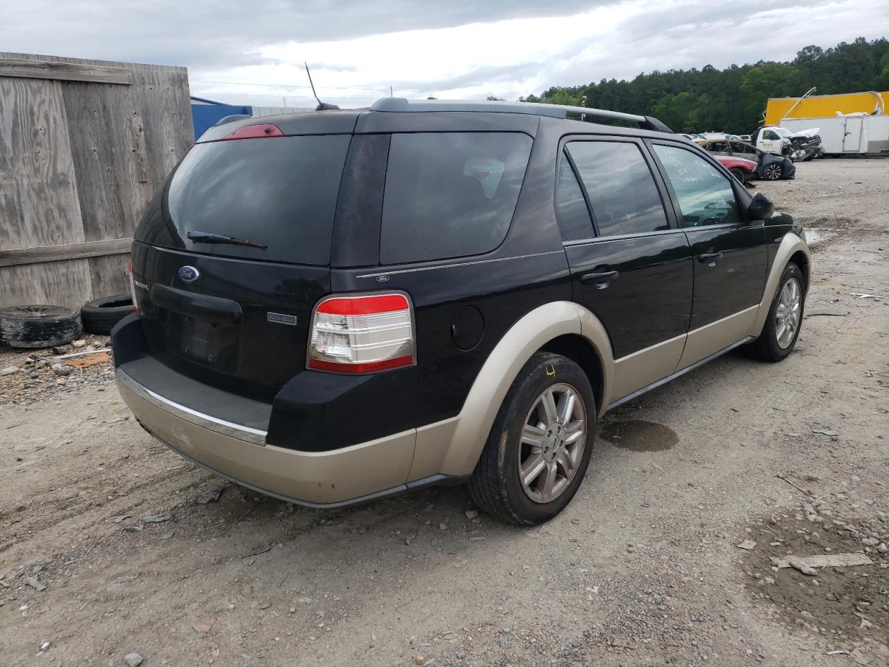 Photo 4 from auction – 2008 FORD TAURUS X E with VIN 1FMDK07W38GA12003