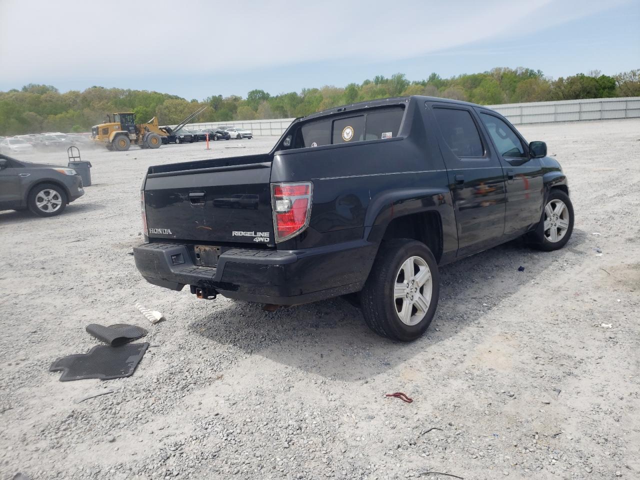 Photo 4 from auction – 2012 HONDA RIDGELINE with VIN 5FPYK1F56CB458855