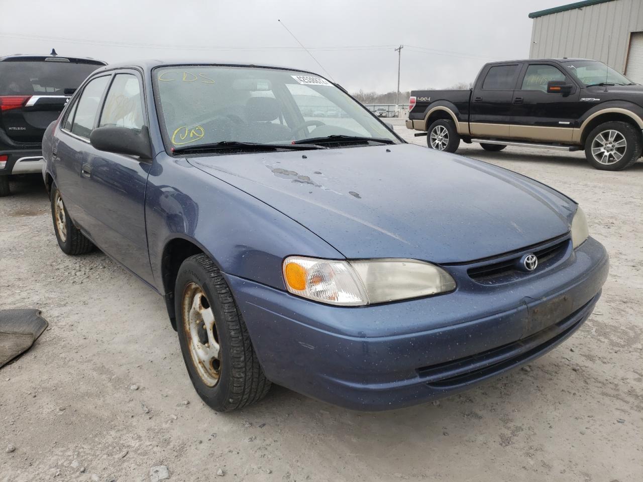 TOYOTA COROLLA VE 1999 with VIN 2T1BR12E2XC236176 - Photo from auction