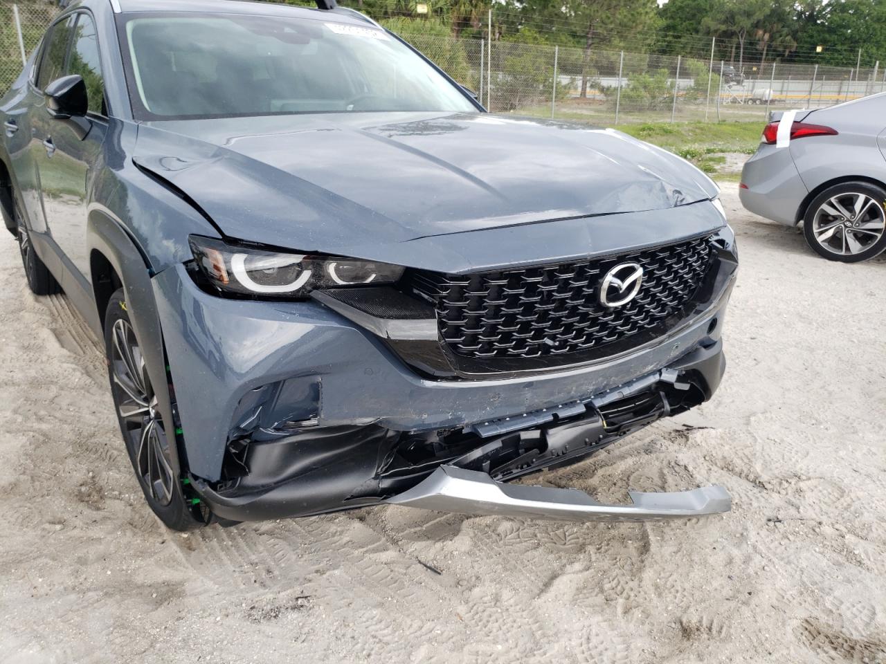 Photo 9 from auction – 2023 MAZDA CX-5 with VIN 7MMVABEY6PN102302