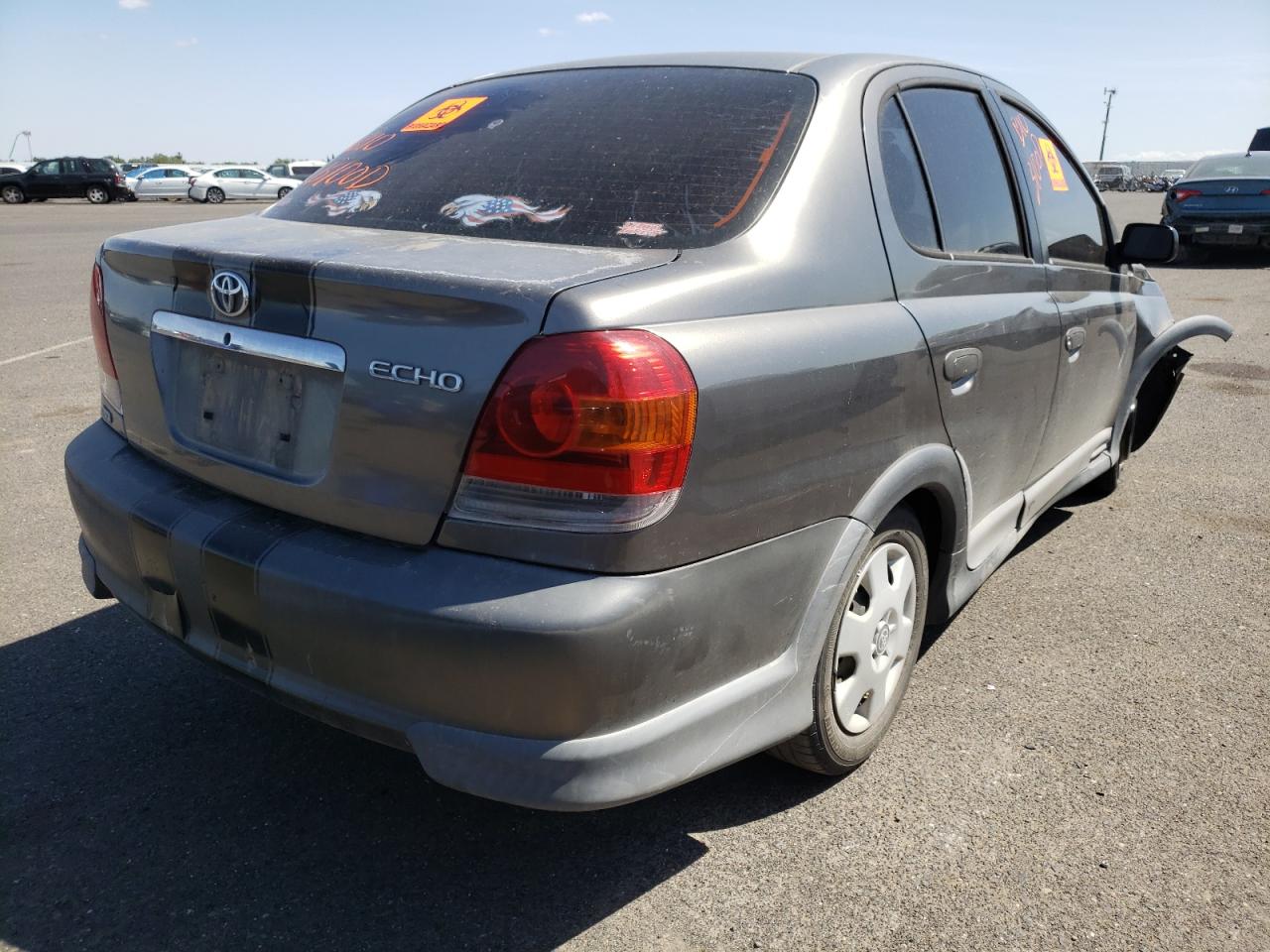 Photo 4 from auction – 2003 TOYOTA ECHO with VIN JTDBT123730306680