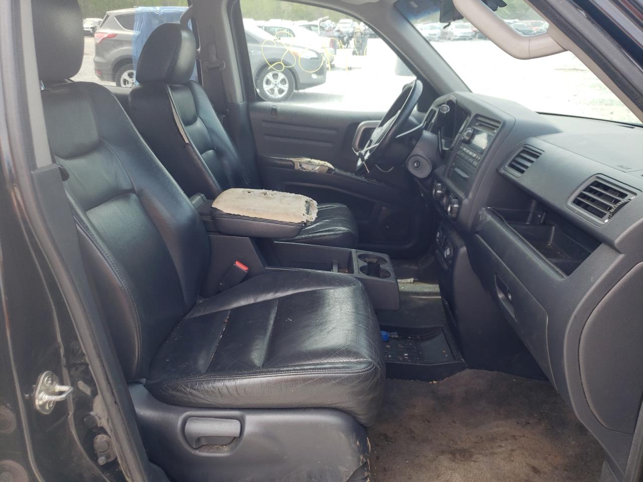 Photo 5 from auction – 2012 HONDA RIDGELINE with VIN 5FPYK1F56CB458855