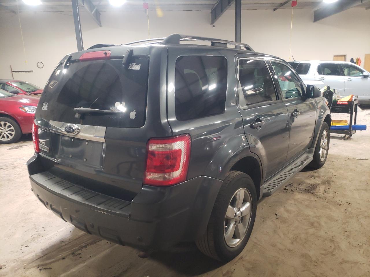 Photo 4 from auction – 2009 FORD ESCAPE LIM with VIN 1FMCU04769KD16279