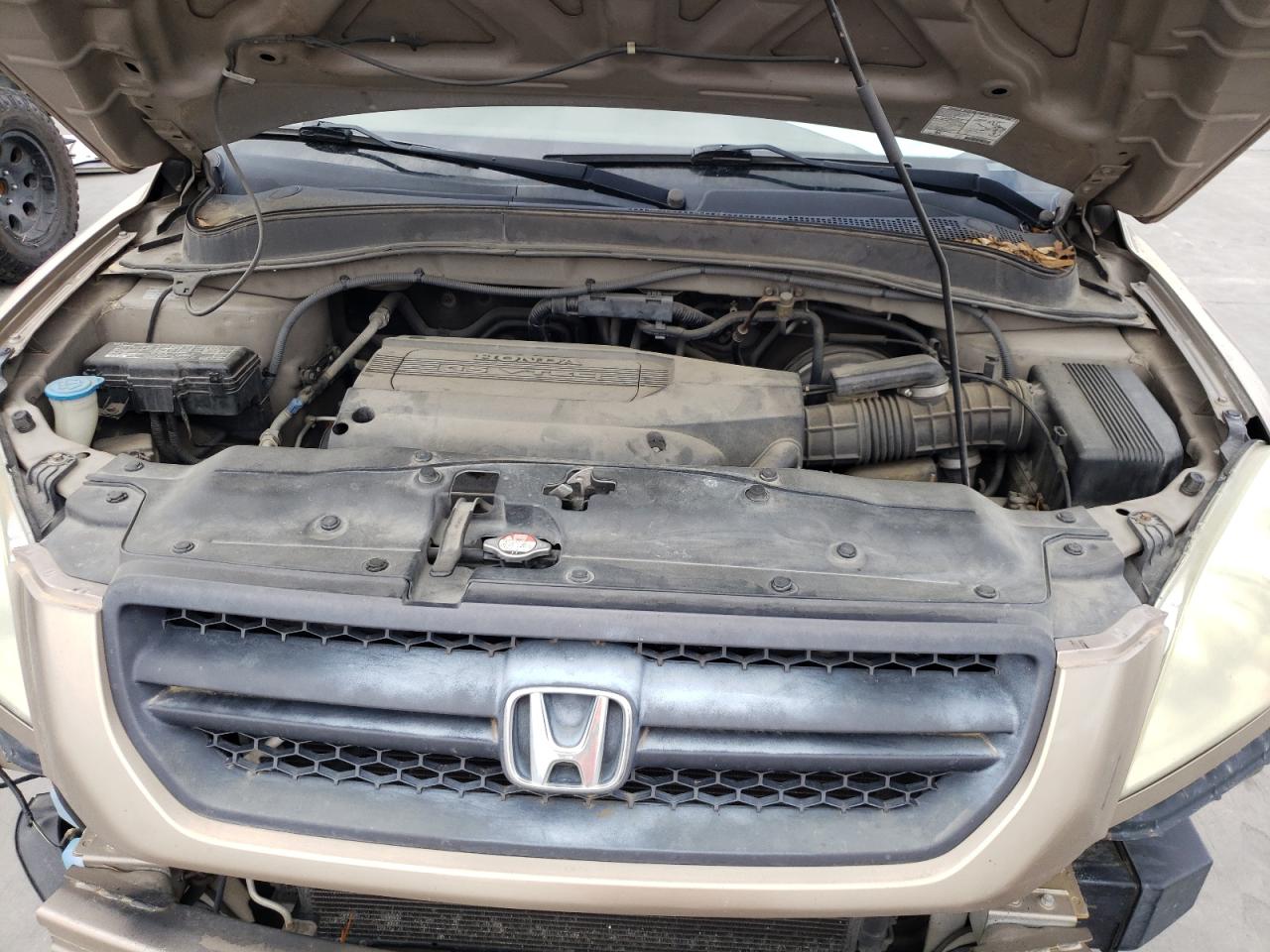 Photo 7 from auction – 2004 HONDA PILOT EX with VIN 2HKYF184X4H596760