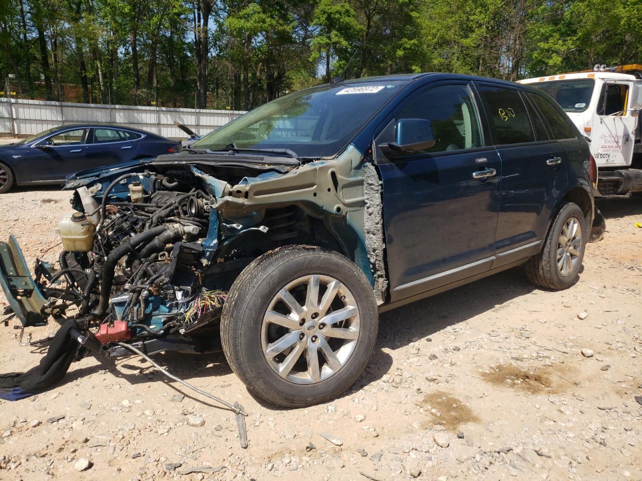 Photo 2 from auction – 2011 FORD EDGE SEL with VIN 2FMDK3JC4BBA00733