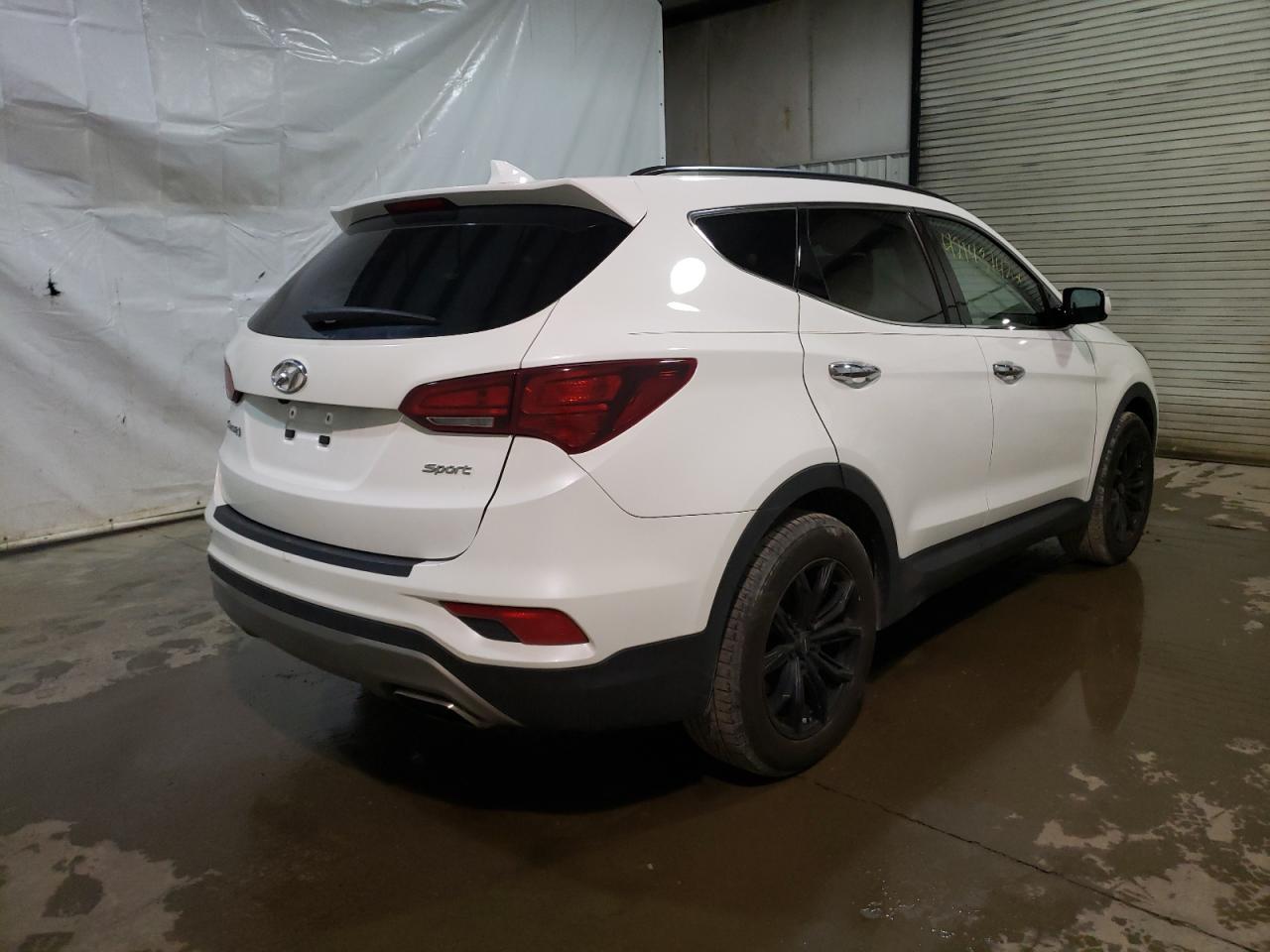 Photo 4 from auction – 2017 HYUNDAI SANTA FE S with VIN 5NMZU3LB7HH031624