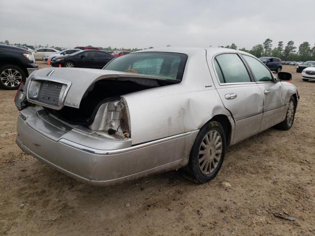 Photo 4 from auction – 2003 LINCOLN TOWN CAR E with VIN 1LNHM81W53Y633748