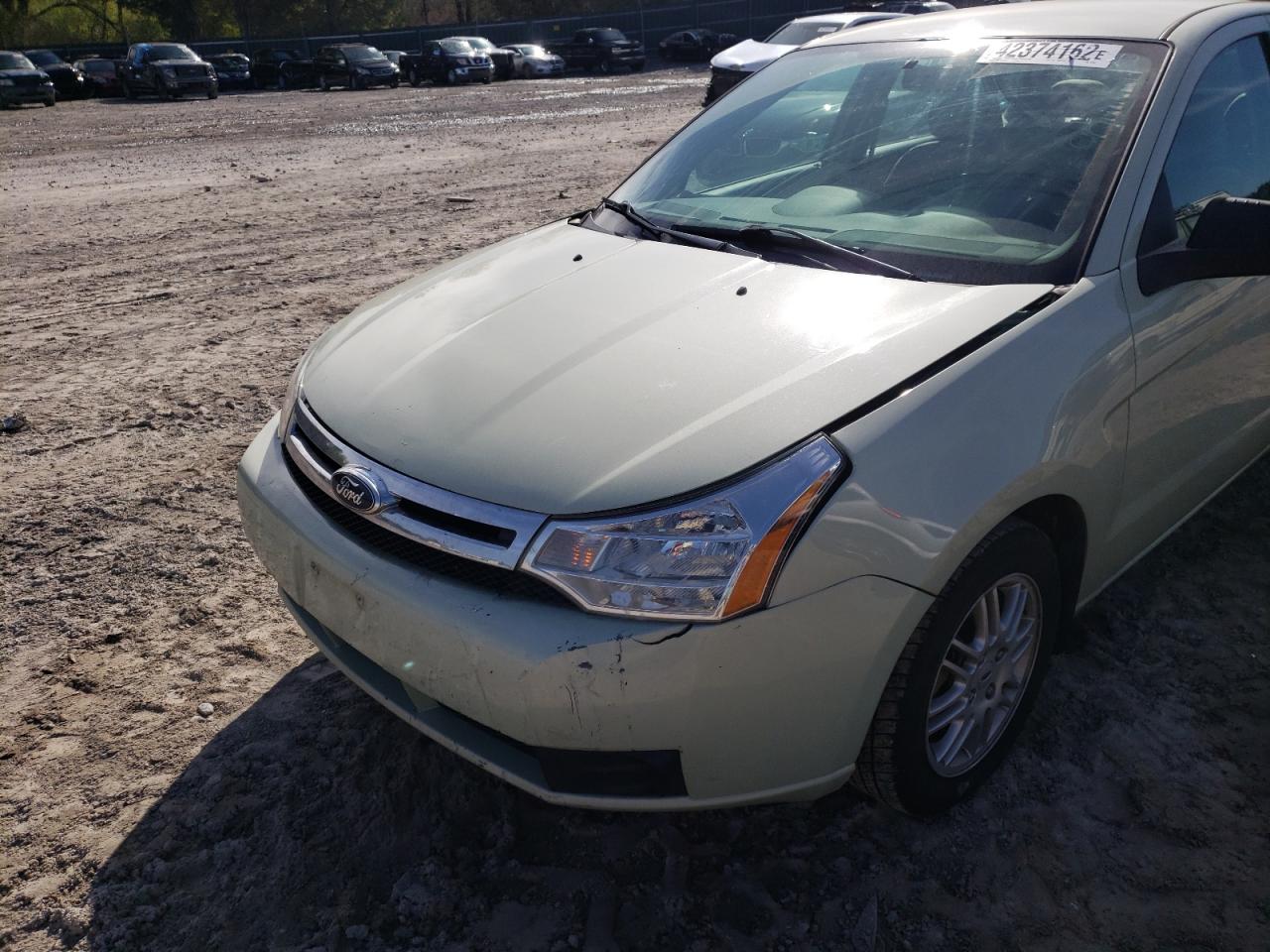 Photo 9 from auction – 2011 FORD FOCUS SE with VIN 1FAHP3FN6BW126839