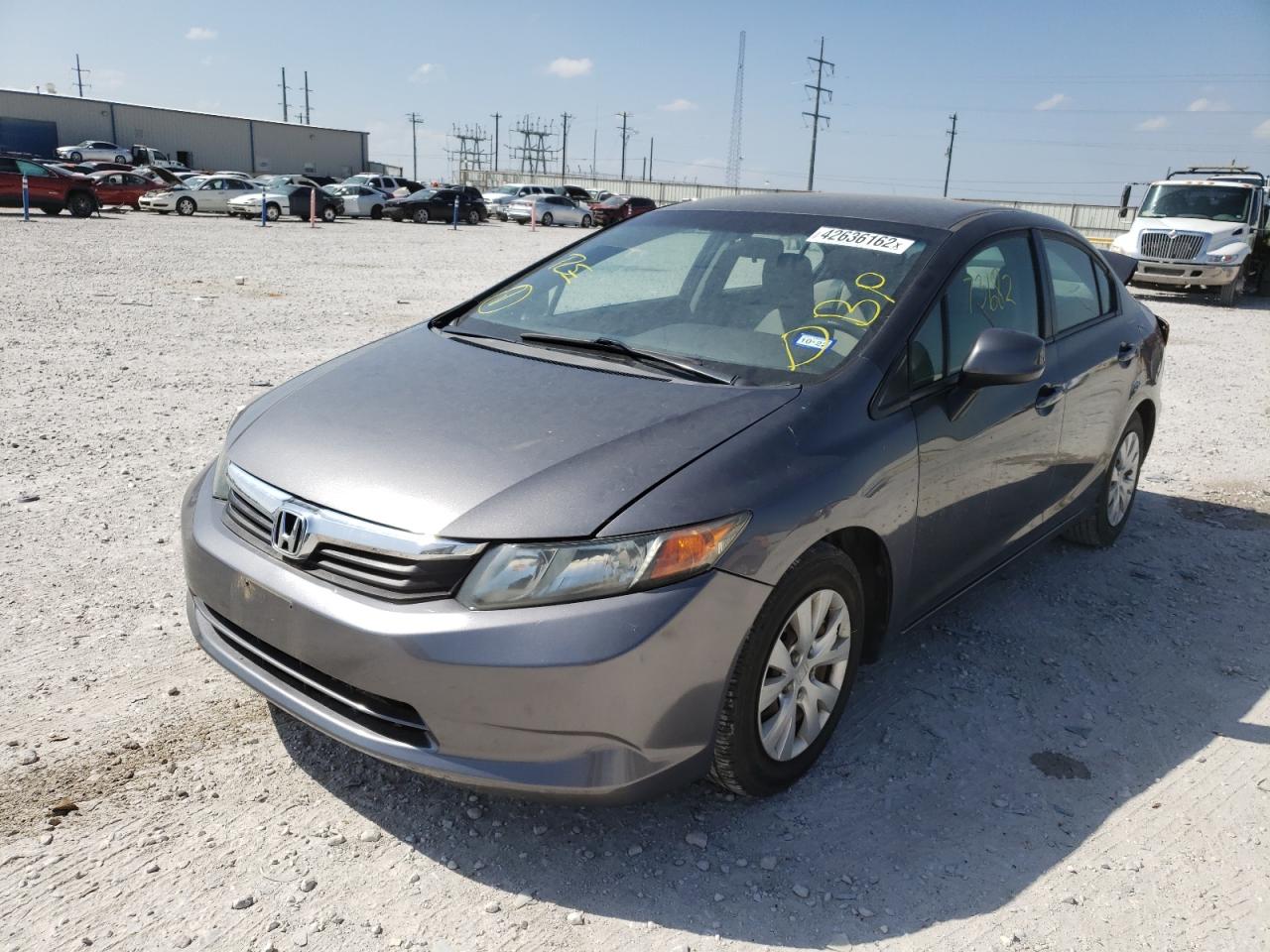 Photo 2 from auction – 2012 HONDA CIVIC LX with VIN 2HGFB2F54CH555571