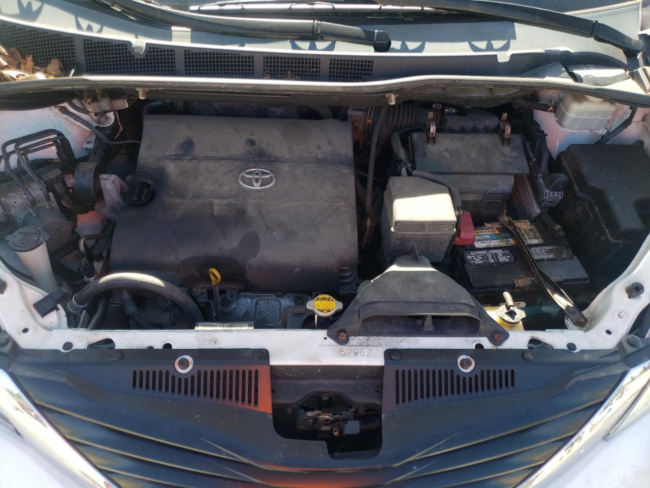 Photo 7 from auction – 2012 TOYOTA SIENNA LE with VIN 5TDKK3DC9CS190715