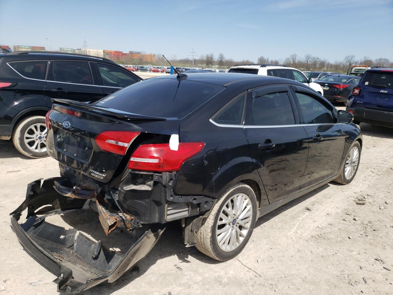 Photo 4 from auction – 2015 FORD FOCUS TITA with VIN 1FADP3J2XFL293059