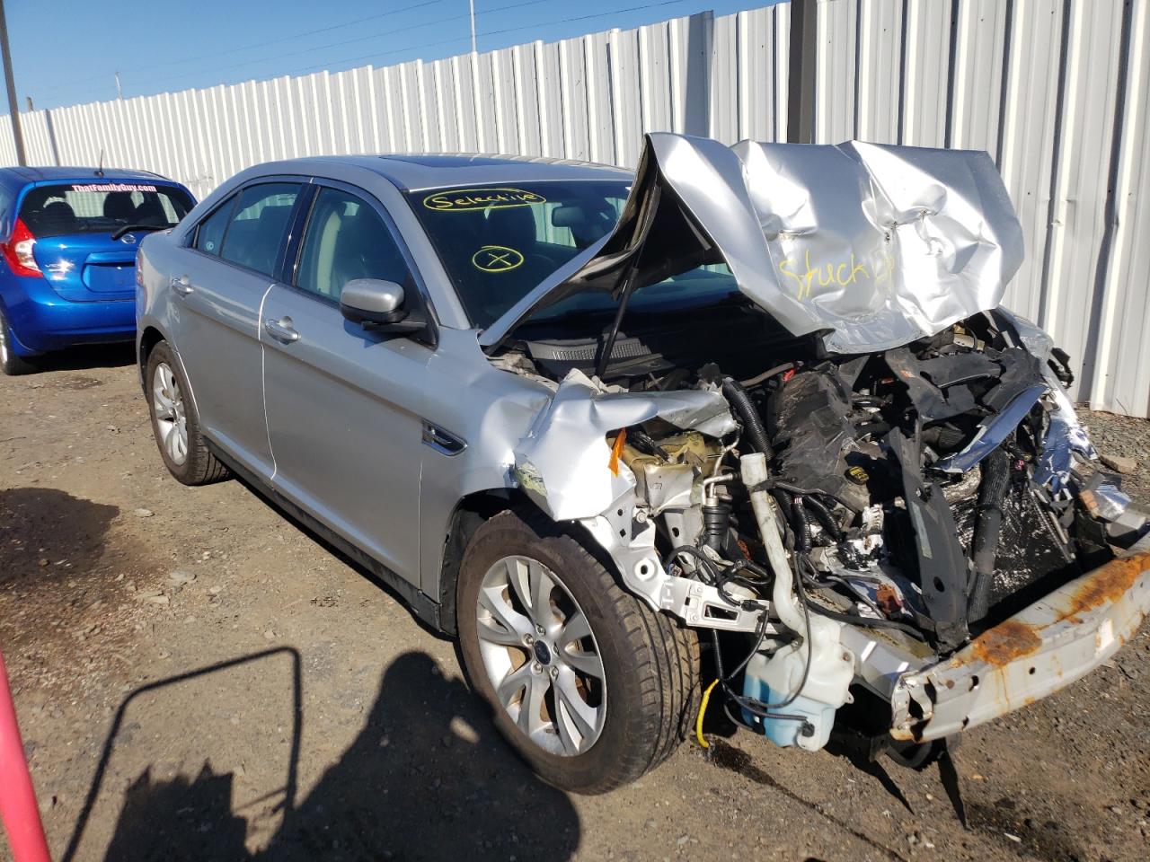FORD TAURUS SEL 2012 with VIN 1FAHP2EW9CG119142 - Photo from auction
