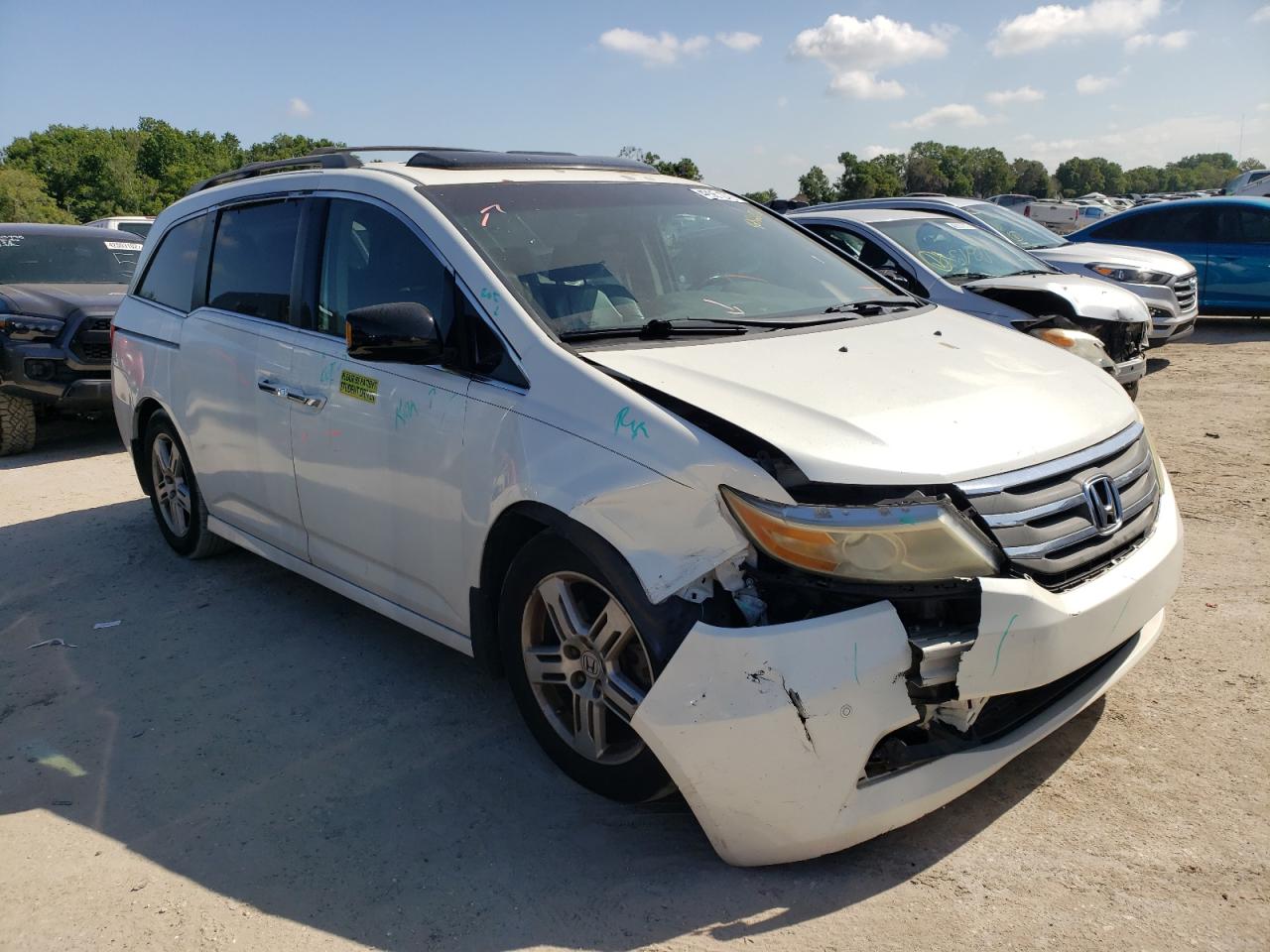 HONDA ODYSSEY TO 2012 with VIN 5FNRL5H92CB047731 - Photo from auction