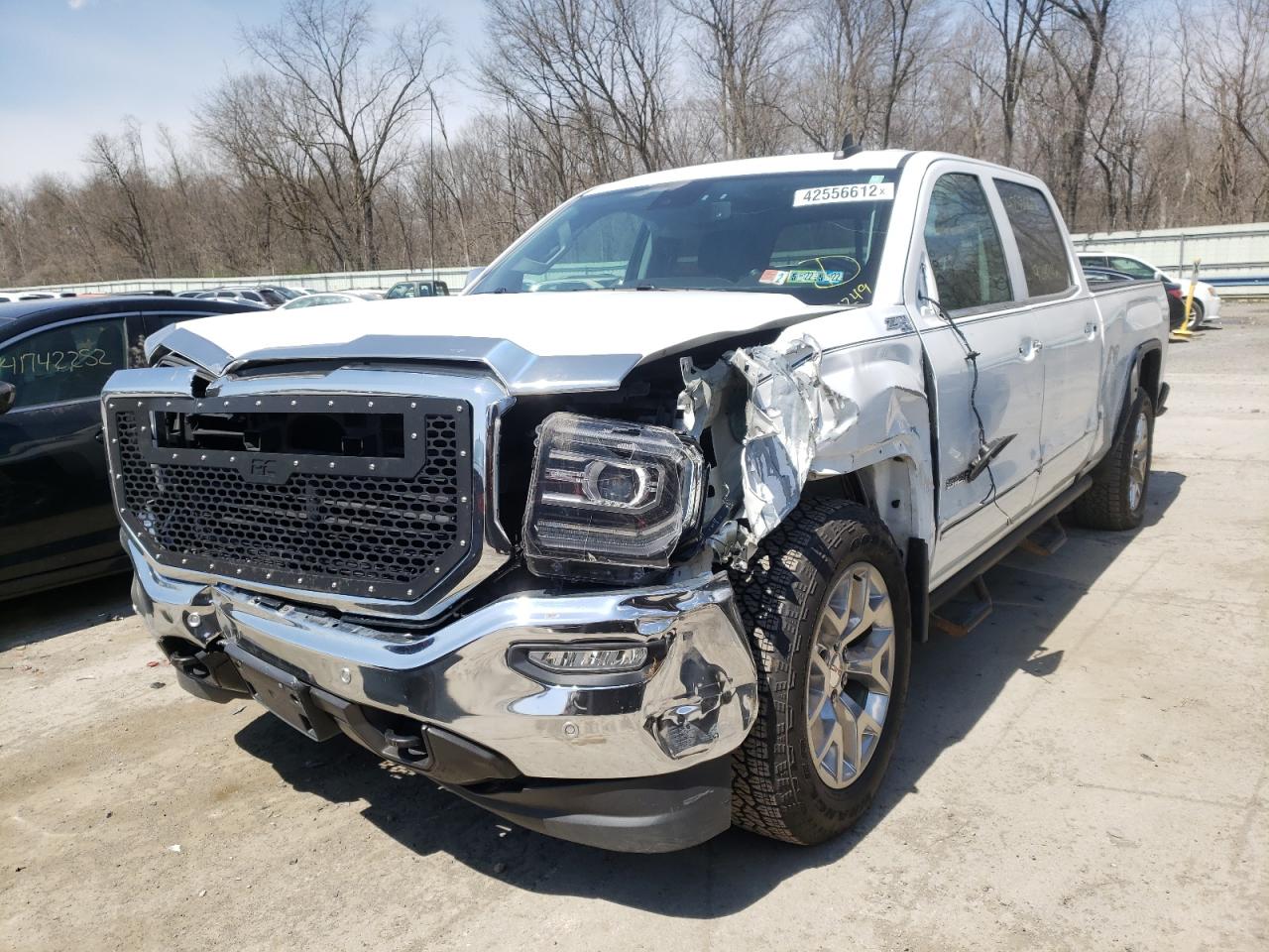 Photo 2 from auction – 2018 GMC SIERRA K15 with VIN 3GTU2NEC5JG255042