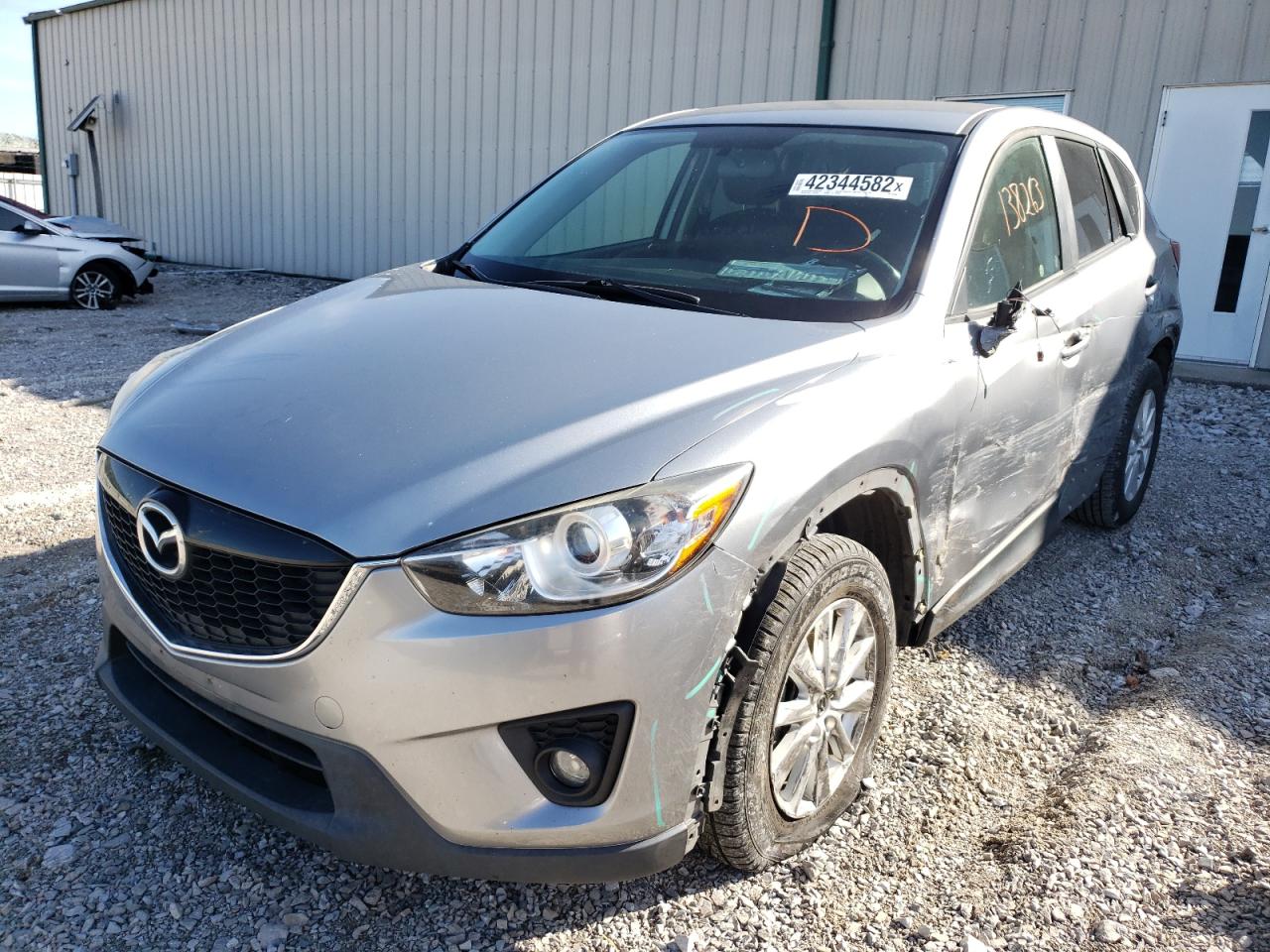 Photo 2 from auction – 2014 MAZDA CX-5 TOURI with VIN JM3KE2CY2E0391559