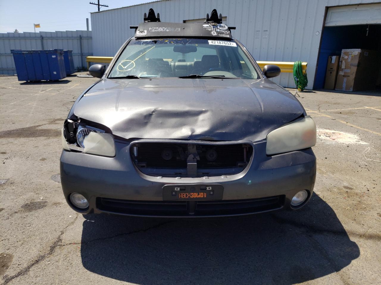 Photo 9 from auction – 2003 NISSAN MAXIMA GLE with VIN JN1DA31A43T430918
