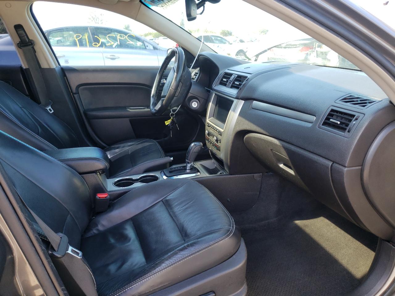 Photo 5 from auction – 2011 FORD FUSION HYB with VIN 3FADP0L31BR140053
