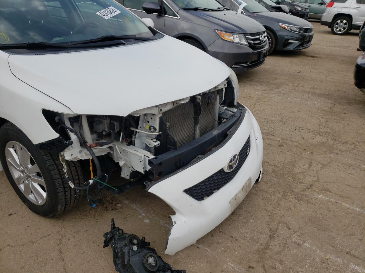 Photo 9 from auction – 2009 TOYOTA COROLLA BA with VIN 1NXBU40E39Z014069