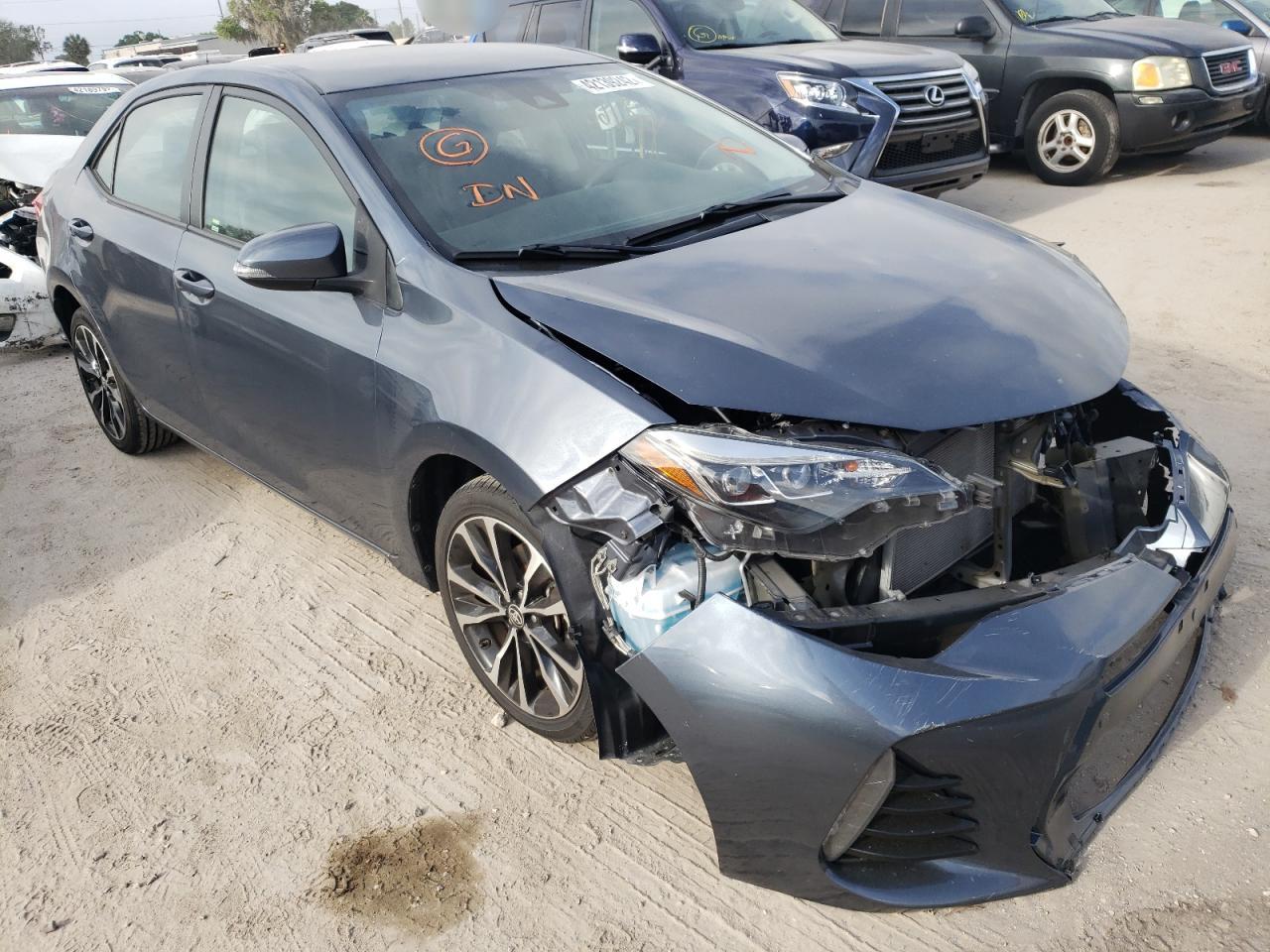 TOYOTA COROLLA L 2018 with VIN 5YFBURHE9JP818612 - Photo from auction