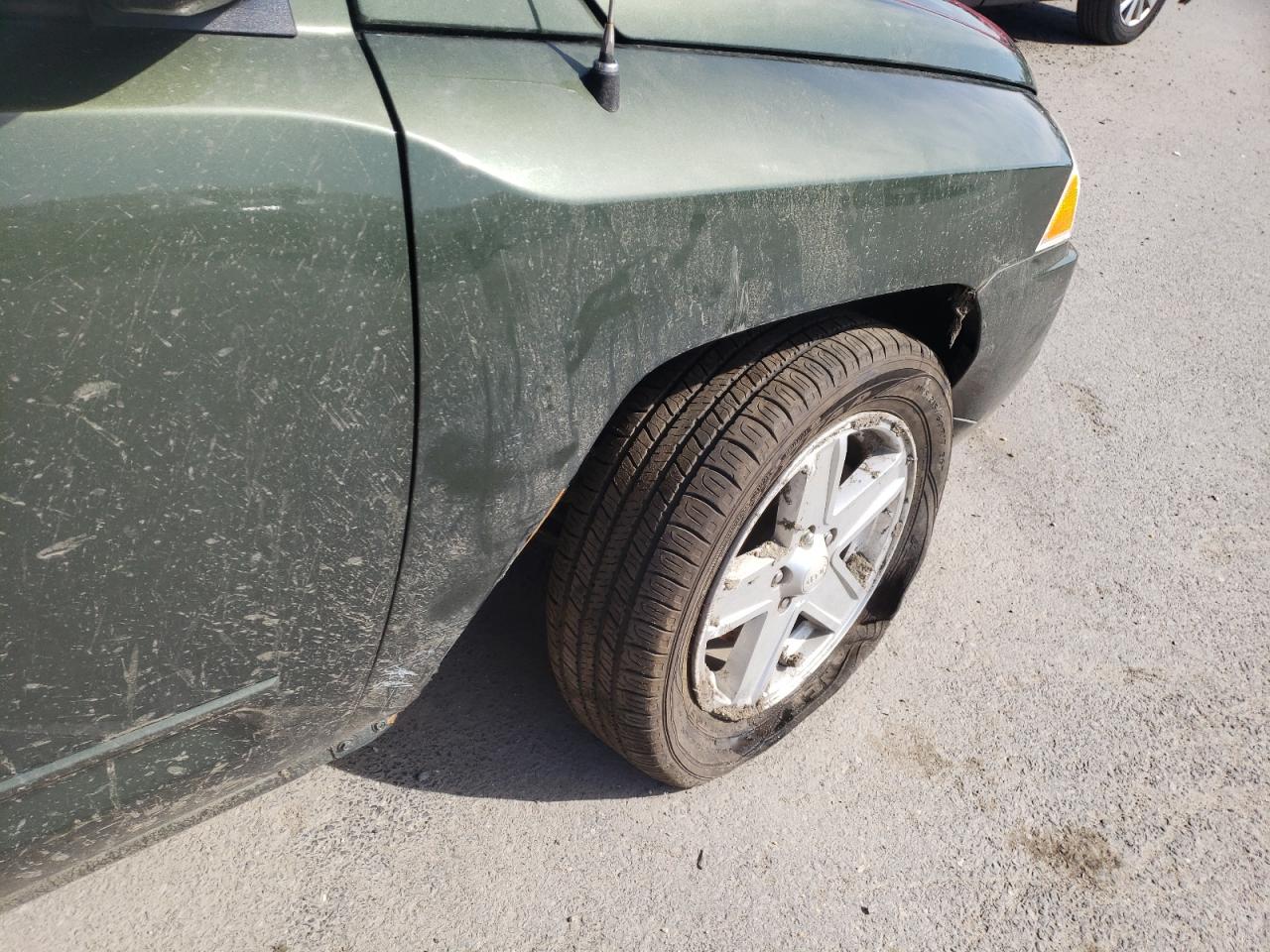 Photo 9 from auction – 2009 JEEP COMPASS SP with VIN 1J4FF47B79D107392