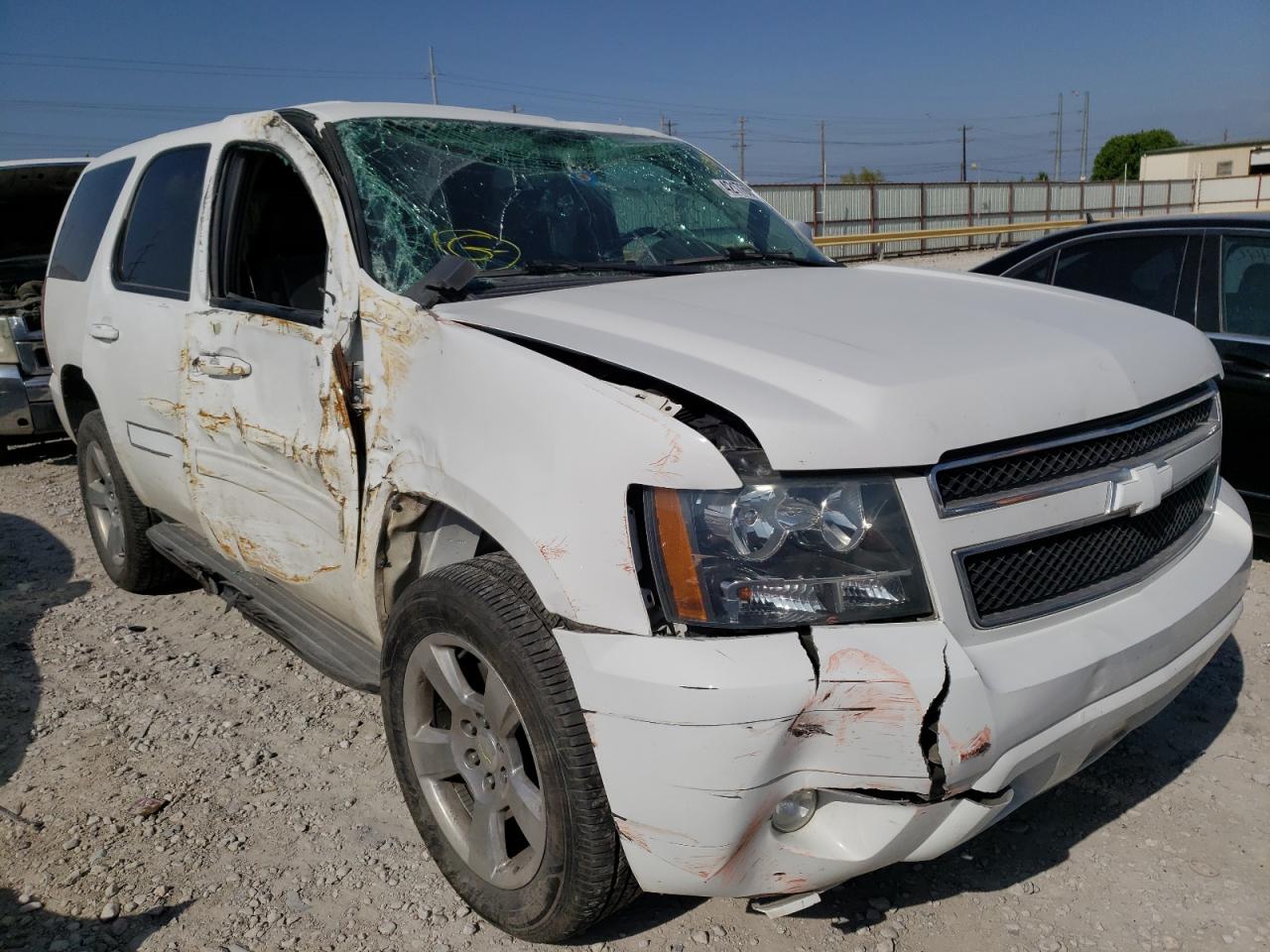 CHEVROLET TAHOE C150 2012 with VIN 1GNSCAE03CR213823 - Photo from auction