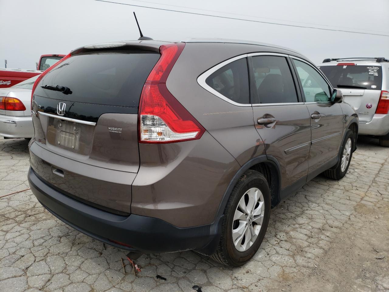 Photo 4 from auction – 2013 HONDA CR-V EXL with VIN 5J6RM3H77DL010943
