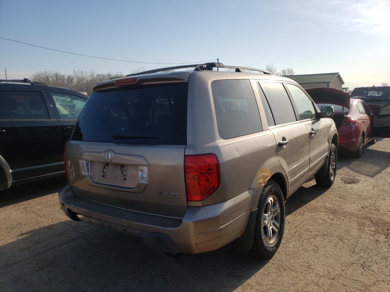 Photo 4 from auction – 2003 HONDA PILOT EXL with VIN 2HKYF18723H575815