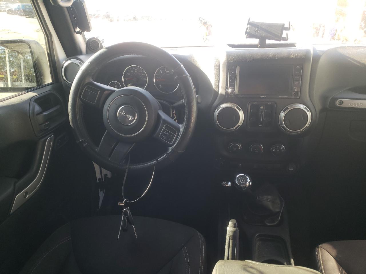Photo 9 from auction – 2014 JEEP WRANGLER U with VIN 1C4BJWEG3EL174925