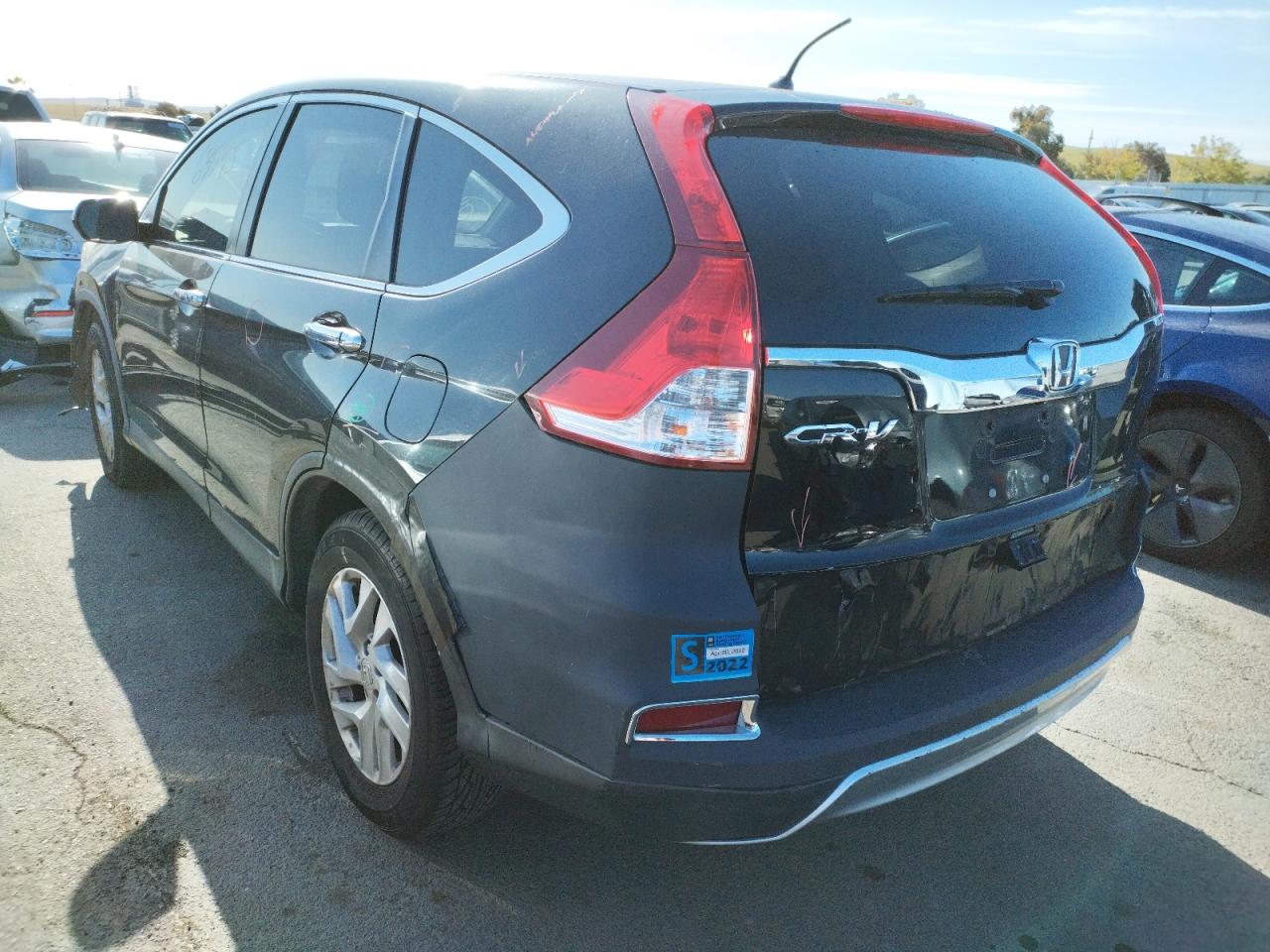 Photo 3 from auction – 2015 HONDA CR-V EX with VIN 3CZRM3H53FG705676