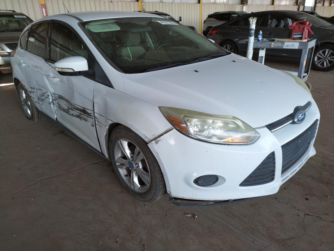 FORD FOCUS SE 2013 with VIN 1FADP3K28DL210062 - Photo from auction