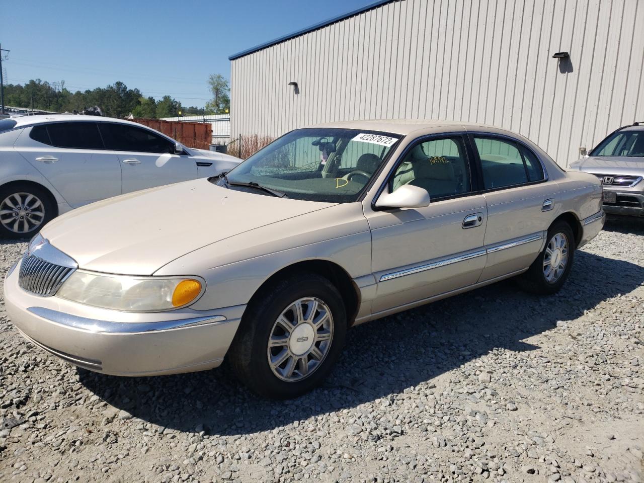 Photo 2 from auction – 2000 LINCOLN CONTINENTA with VIN 1LNHM97V1YY822280
