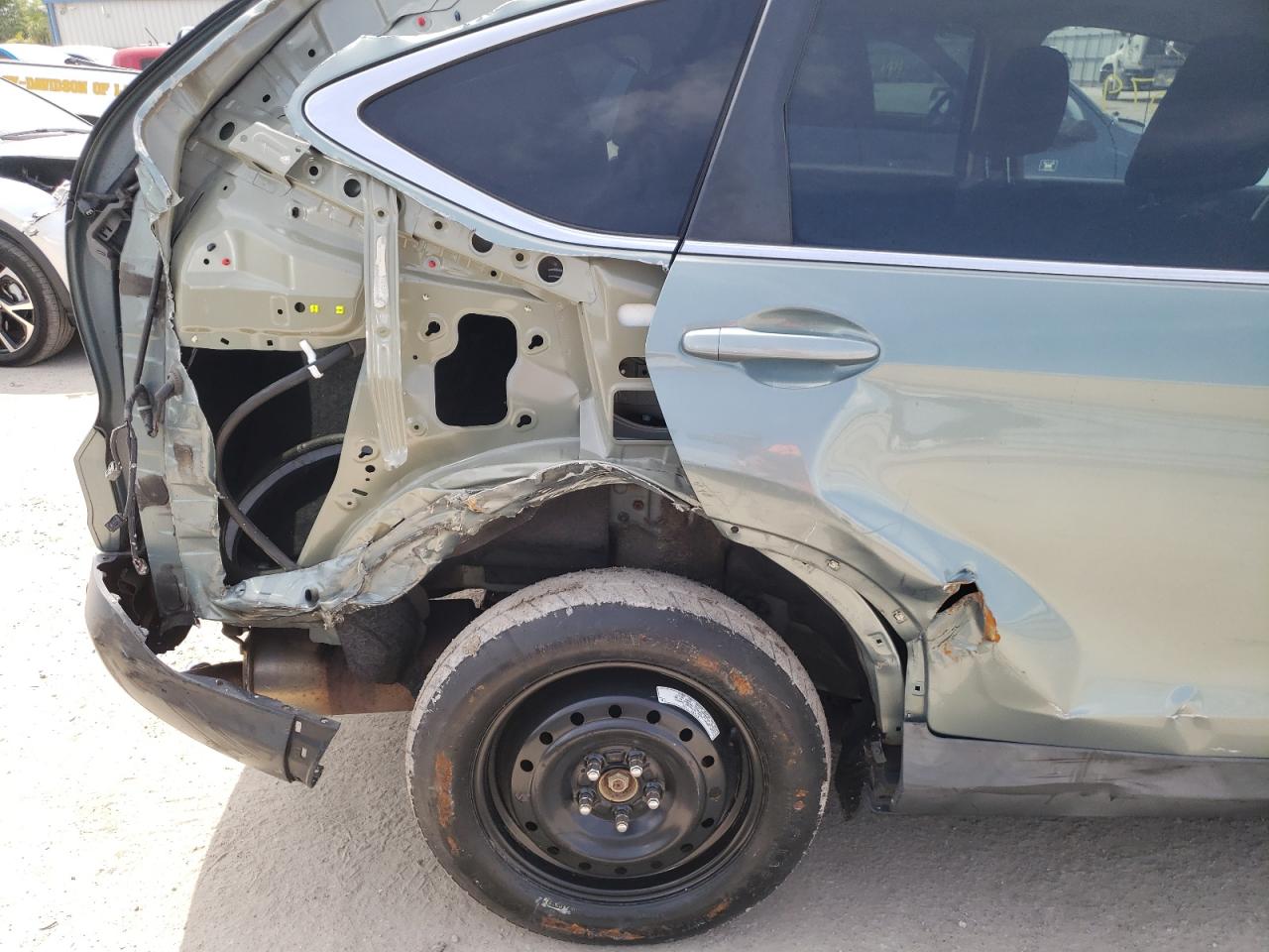 Photo 9 from auction – 2012 HONDA CR-V EX with VIN 2HKRM4H51CH611178