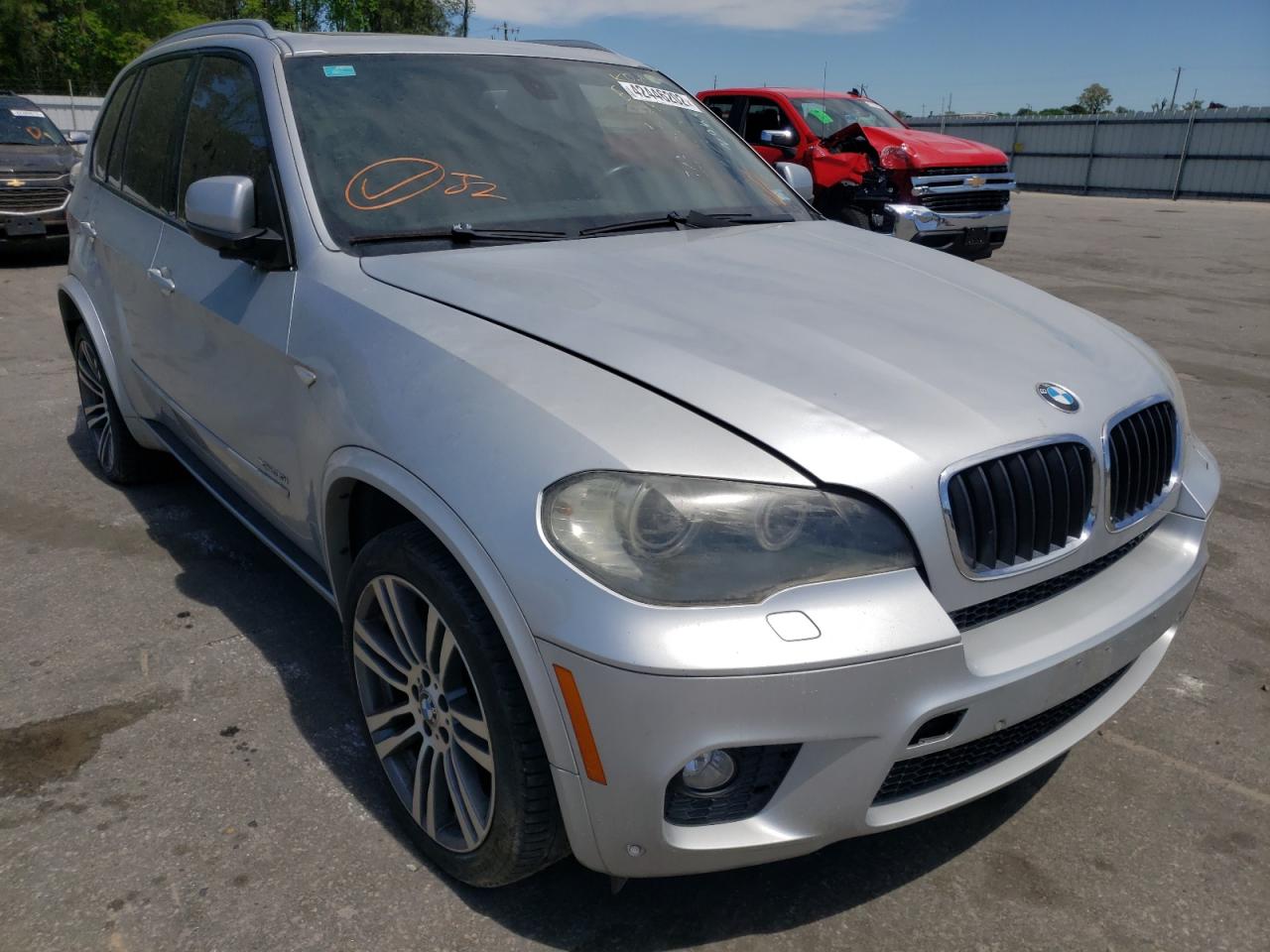 BMW X5 XDRIVE3 2011 with VIN 5UXZV4C5XBL401269 - Photo from auction