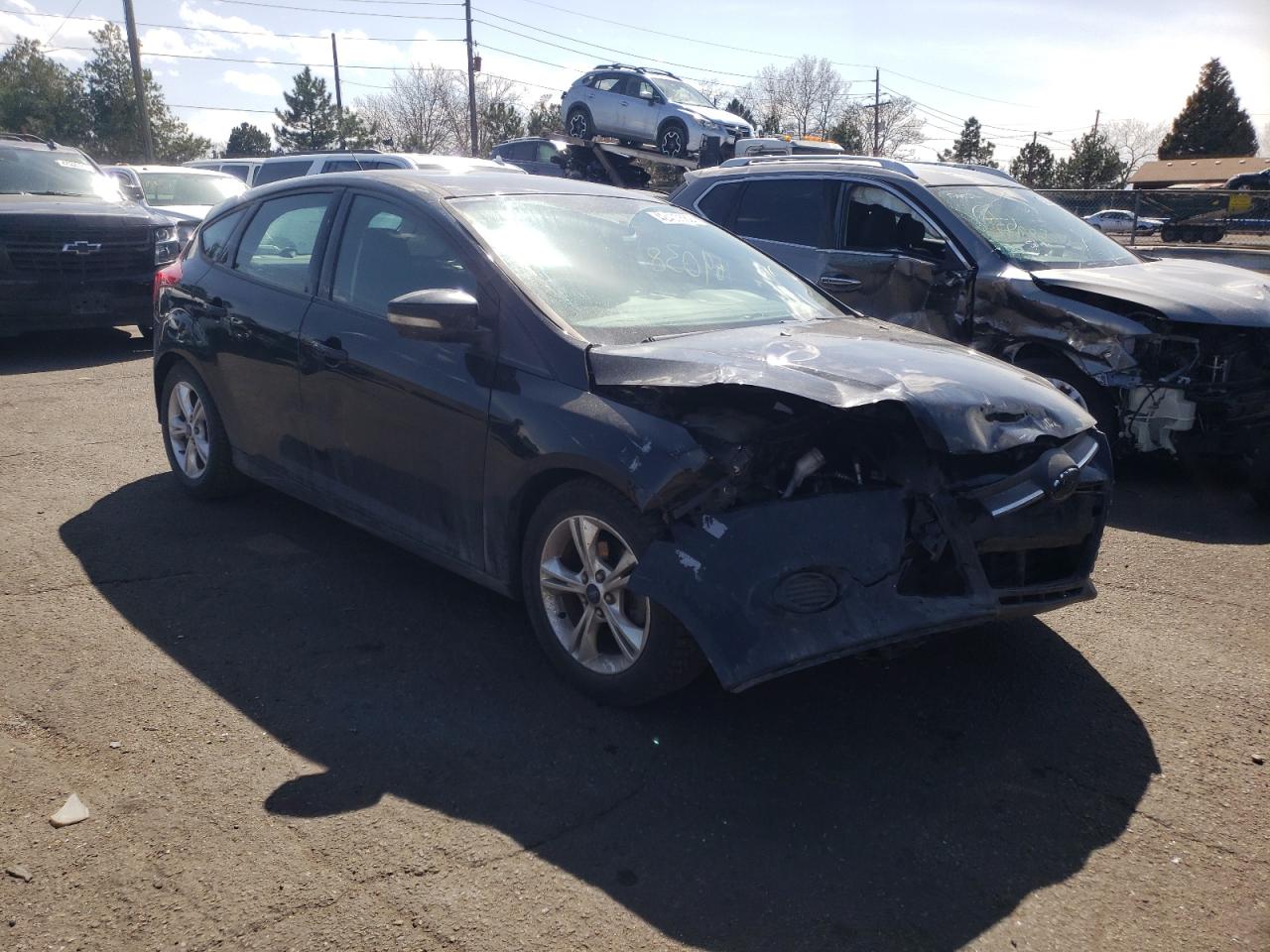 FORD FOCUS SE 2014 with VIN 1FADP3K24EL131117 - Photo from auction