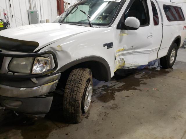 Photo 9 from auction – 2003 FORD F150 with VIN 1FTRX18L93NB49022