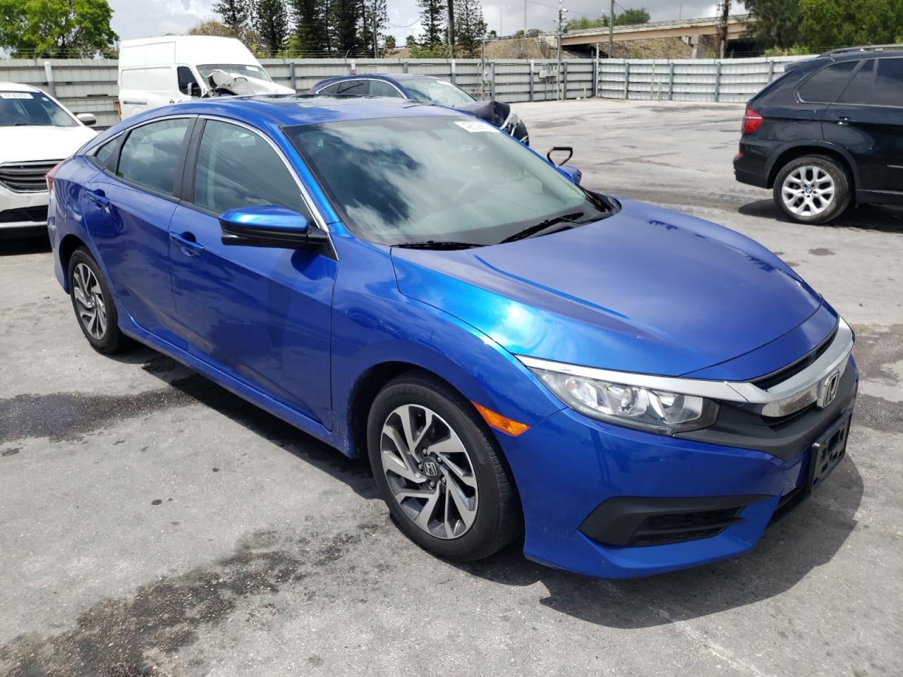 HONDA CIVIC EX 2017 with VIN 19XFC2F77HE216707 - Photo from auction