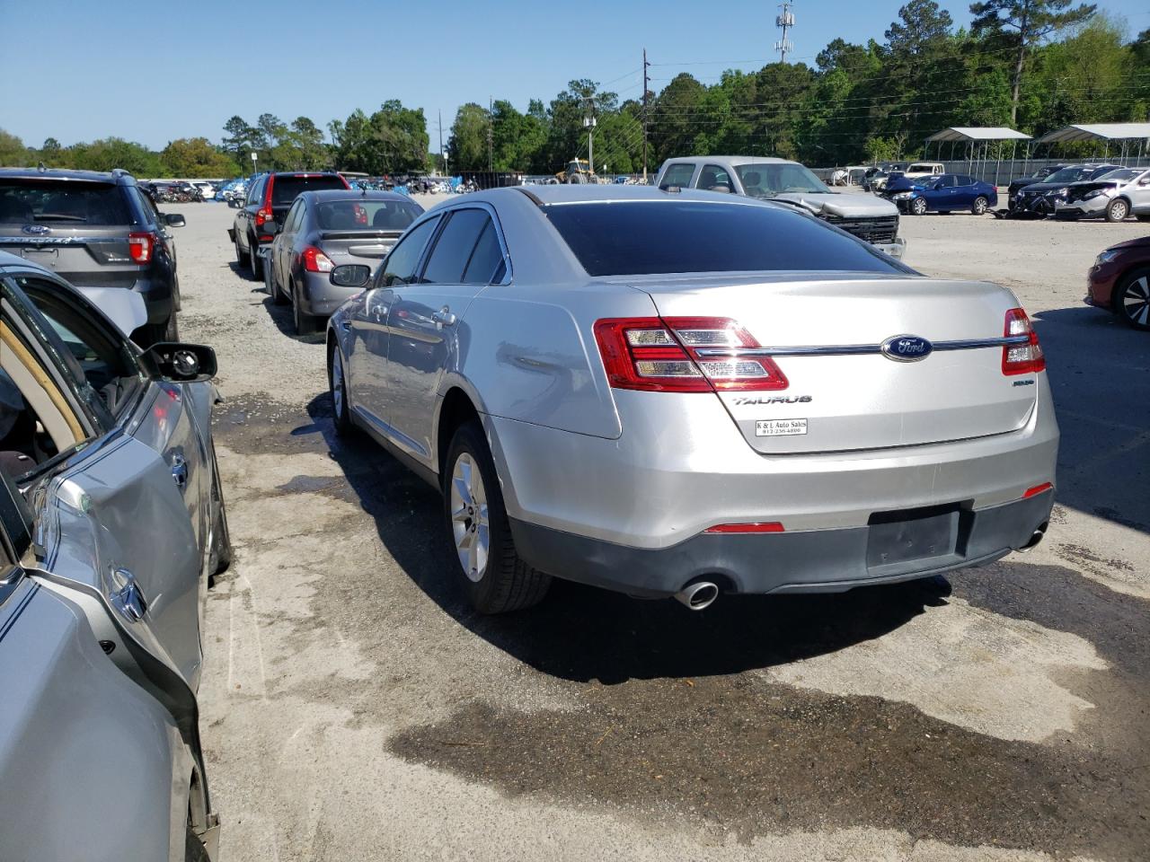 Photo 3 from auction – 2013 FORD TAURUS SE with VIN 1FAHP2D83DG212937